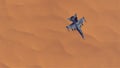 Supersonic Jet Aircraft High Altitude Above Sand Dunes Barren Desert Royalty Free Stock Photo