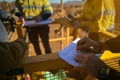 Supervisor issuing confined space permit on the field Royalty Free Stock Photo