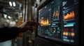Supervisor monitoring production line using digital display in factory Royalty Free Stock Photo