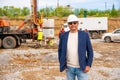 Supervisor overseeing soil sampling and pile drilling process on construction site. Responsible specialist ensuring Royalty Free Stock Photo
