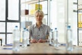 Supervisor patiently waits for partners in conference hall