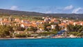 Supetar city in Brac island, Croatia. View from the sea. Picturesque scenic view on Supetar on Brac island, Croatia. Panoramic Royalty Free Stock Photo