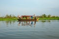 Traditional Thai Gondola boat with tourist in the river Royalty Free Stock Photo