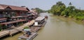 Buildings and rafts on Tachin riverside at Sam chug district, Suphan Buri in year 2018