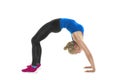 Supple athletic woman bending over backwards Royalty Free Stock Photo