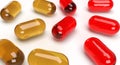 Supplement capsules 3d yellow and red gel pearls Royalty Free Stock Photo