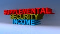 Supplemental security income on blue Royalty Free Stock Photo