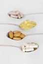 Supplements on teaspoons Royalty Free Stock Photo