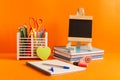 Supplies for back to school with a blackboard Royalty Free Stock Photo