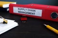 Supply Chain Management SCM papers in the folder Royalty Free Stock Photo