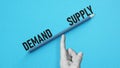 Supply and demand balance concept is shown using the text Royalty Free Stock Photo