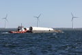 Supply vessel with demolition parts of offshore wind turbine Royalty Free Stock Photo