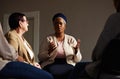 Support, black woman and senior group therapy with understanding, feelings and talking in session. Mental health, grief Royalty Free Stock Photo