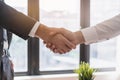 Support, business people, happy asian young man in suit, making handshake, shake hand together with partnership, customer or Royalty Free Stock Photo