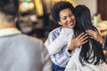 Support group patients hug each other during the therapy session. Royalty Free Stock Photo