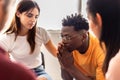 Support group of people sitting in circle during therapy session Royalty Free Stock Photo