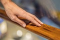 support, help and people concept - close up of man hand holding to railing Royalty Free Stock Photo