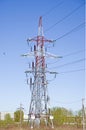 Support high-voltage power lines, close-up. blue sky without clouds. Electrical industry Royalty Free Stock Photo