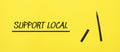 support local sign with black marker on a yellow background. With copy space ready for your text