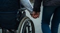 Support and Love for the Disabled A Touching Moment of Human Connection and Compassion Royalty Free Stock Photo