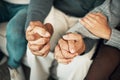 Support, love and family holding hands on sofa for comforting embrace, prayer and trust together at home. Motivation Royalty Free Stock Photo