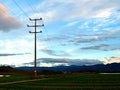 Support of power lines in the evening Royalty Free Stock Photo