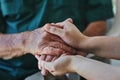 Support, senior man and woman holding hands with care, love and empathy while together for closeup. Hand of elderly male Royalty Free Stock Photo