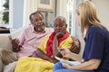 Support Worker Visits Senior Woman Suffering With Depression Royalty Free Stock Photo