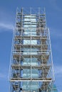 Supported metal scaffolds soar into blue sky