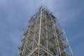 Supported metal scaffolds soar into blue sky