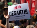 Supporter of Florida Governor Ron DeSantis Holding Up a Sign