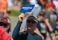 Supporter of Florida Governor Ron DeSantis Holding Up a Sign