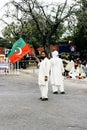 Supporter holding flag of Tehreek-e-Insaf