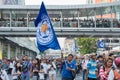 Supporter waves the Leicester City FC flag while waiting for the parade Royalty Free Stock Photo