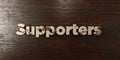 Supporters - grungy wooden headline on Maple - 3D rendered royalty free stock image