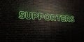 SUPPORTERS -Realistic Neon Sign on Brick Wall background - 3D rendered royalty free stock image