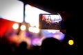 Supporters recording at concert - candid image of crowd at rock show