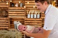 Supporting Hands. Father holding his 14 days old baby girl on his arms Royalty Free Stock Photo