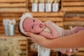 Supporting Hands. Father holding his 14 days old baby girl on his arms Royalty Free Stock Photo