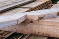 Details of the construction of a frame house. Supporting lock of a wooden beam for connection to the floor of the house Royalty Free Stock Photo