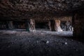 The supporting roof pillars inside the manmade Winspit Quarry Caves, Dorset, UK