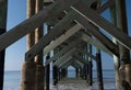 Supporting wooden beams under fishing pier near Madeira Beach