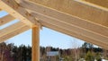 Supporting wooden construction for roof rafters, repeated beams Royalty Free Stock Photo