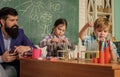 Supportive environment explore STEM. Practical knowledge. Experimenting together. Child care and development. School Royalty Free Stock Photo