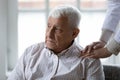 Supportive female nurse comfort upset elderly patient Royalty Free Stock Photo