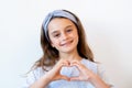 supportive kid love sign happy girl heart gesture Royalty Free Stock Photo