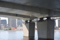 Supports of the bridge across the Moscow River, Nagatinsky metro bridge against the backdrop of houses under