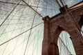 Supports of the Brooklyn Bridge. Geometry of the lines of support ropes and arches against a dramatic sky