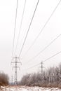 Supports high-voltage power lines winter Royalty Free Stock Photo