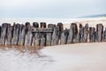 Supports of the old wooden pier Royalty Free Stock Photo